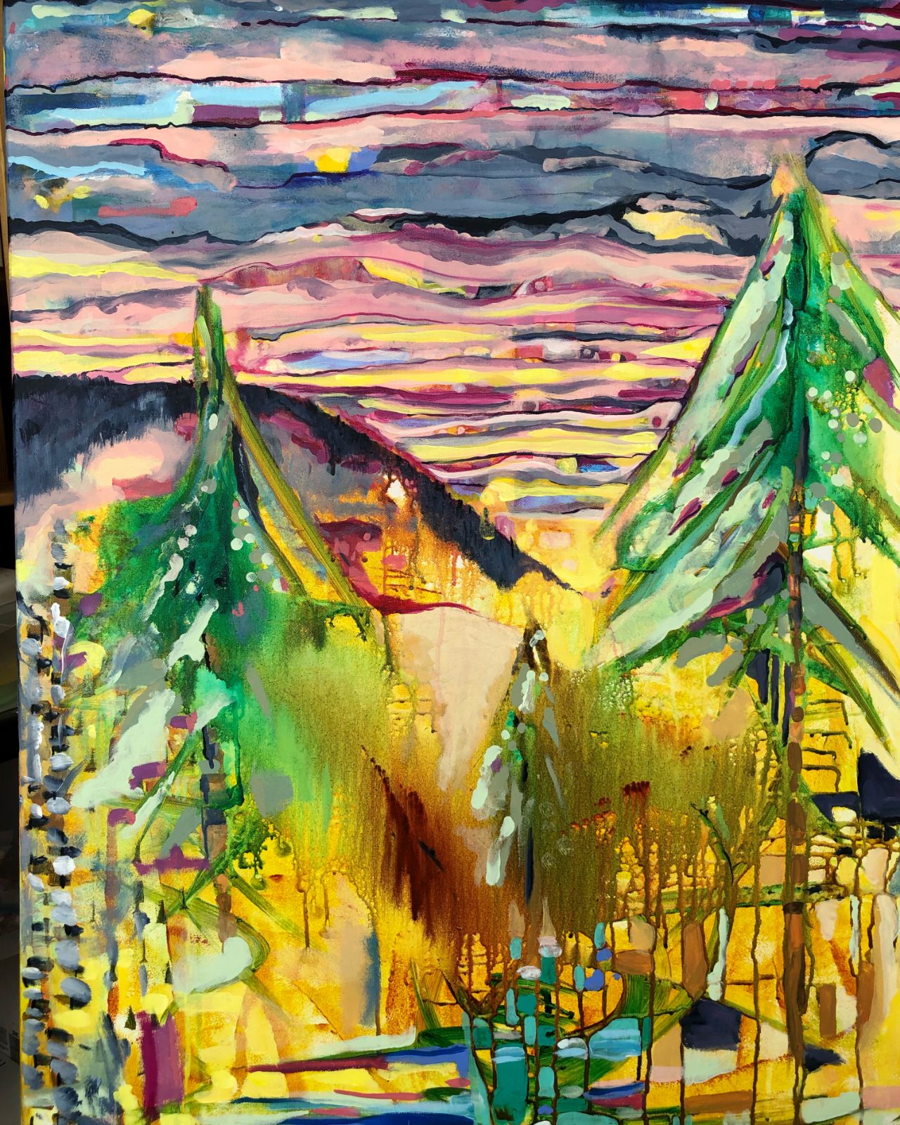 A painting of pine trees and a sunset.